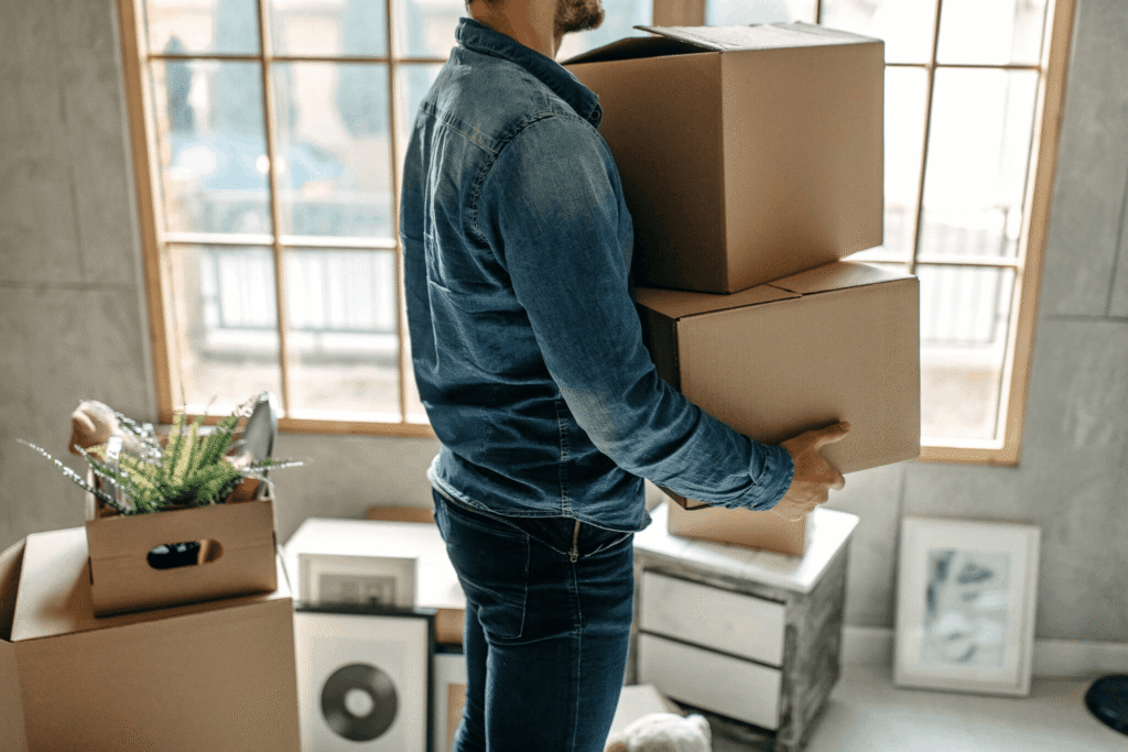 Man carrying moving boxes